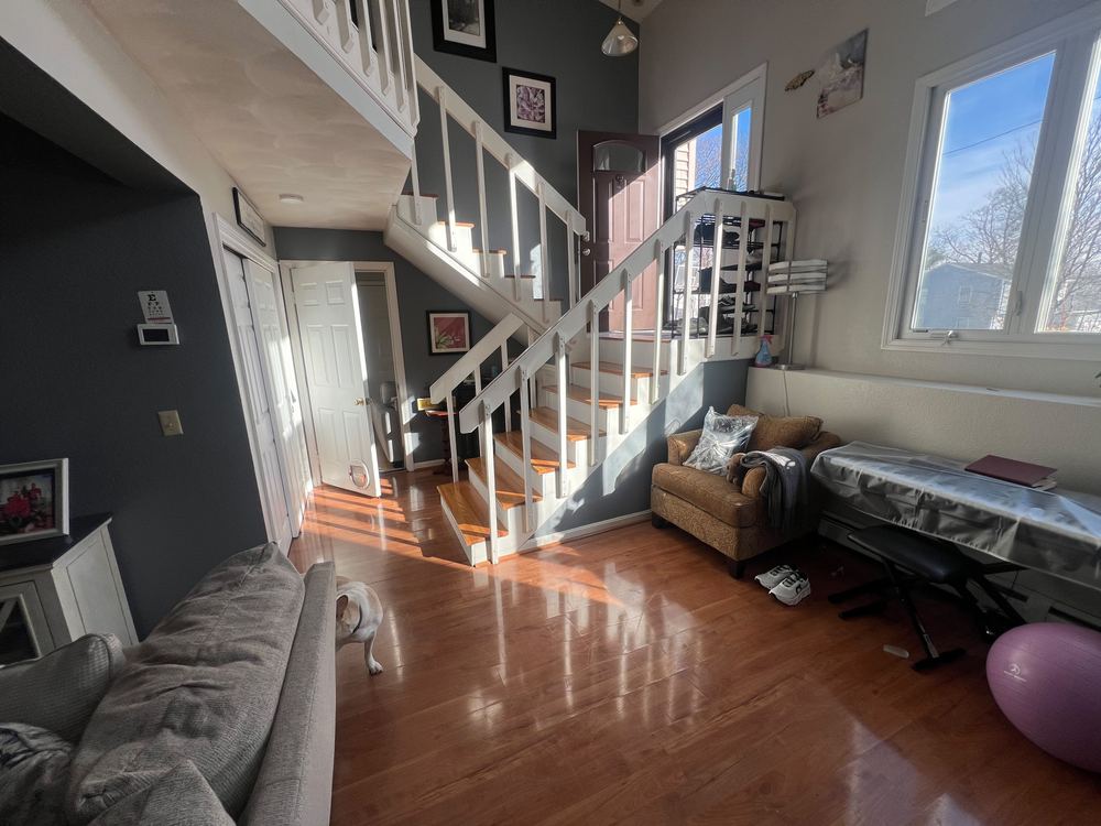 Restored Hardwood Floors and Staircase
