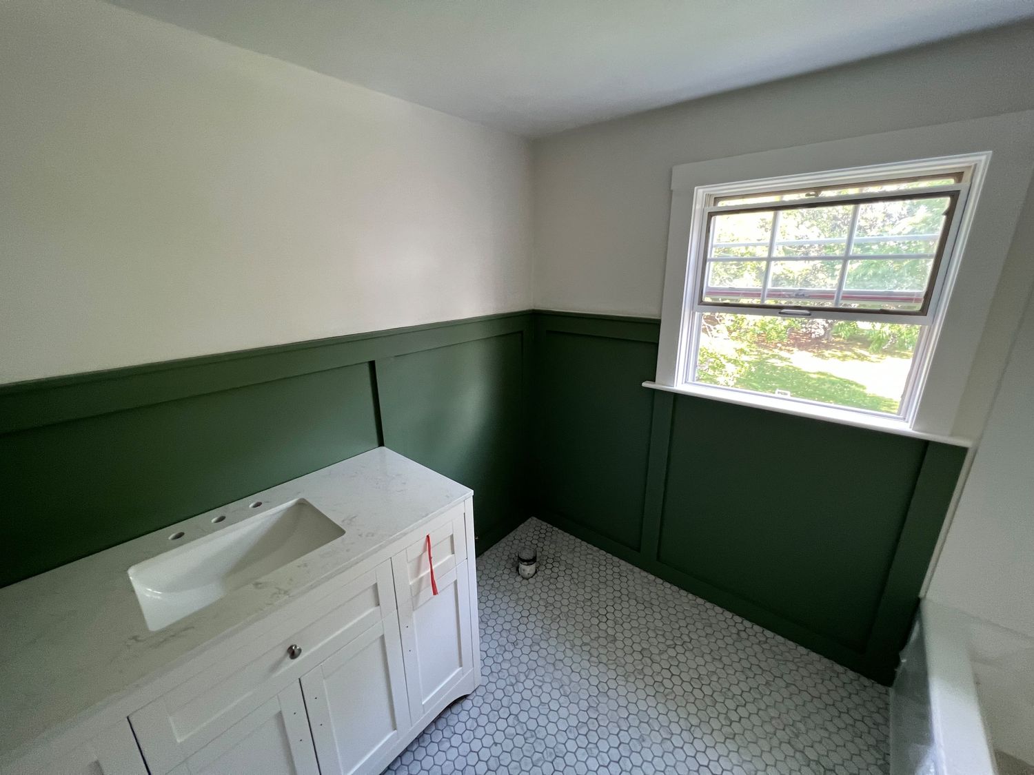 Green Boiserie Bath with Hex Floor
