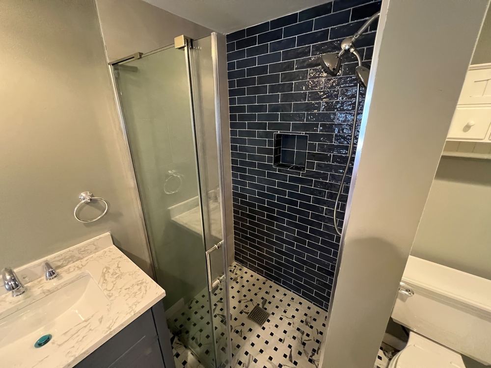 Hardwood Restoration and Blue Subway Bath
